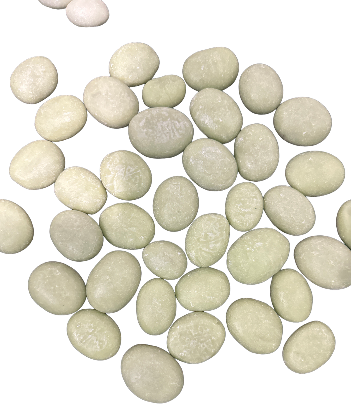 Close-up view of a collection of smooth, rounded cream, white, and pale beige stones with subtle natural color variations.