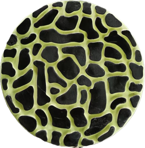 Yellow glow-in-the-dark decorative garden stepping stone with cracked mosaic pattern